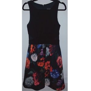 Black Dress With A Floral Pattern Bottom
